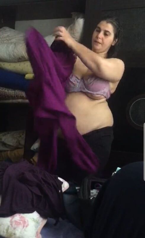 14023