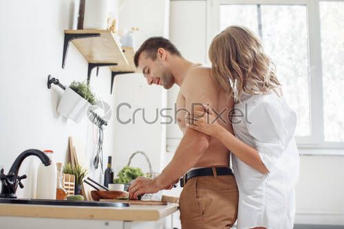stock-photo-loving-couple-cooking-together-in-the-kitchen-at-home-1733938.jpg